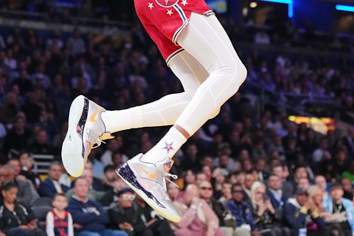 Kevin Durant's silver and orange Nike shoes worn in the 2024 NBA All-Star Game.
